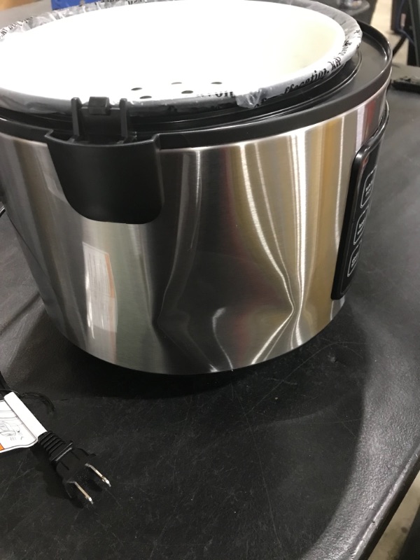 Photo 4 of Aroma ARC-150SB 20-Cup (Cooked) Digital Cool-Touch Rice Cooker, Food Steamer and Slow Cooker
USED / DENT ON SIDE - SEE PHOTO