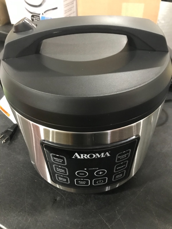 Photo 2 of Aroma ARC-150SB 20-Cup (Cooked) Digital Cool-Touch Rice Cooker, Food Steamer and Slow Cooker
USED / DENT ON SIDE - SEE PHOTO