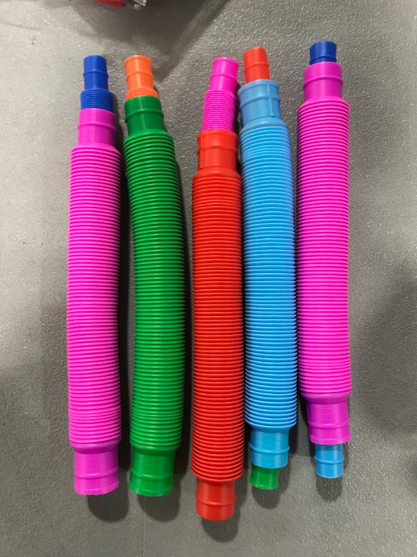 Photo 2 of Fidget/Sensory Toys- Noise Pull Tubes- Various Colors- 10pk