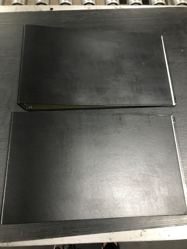 Photo 1 of 2-  3 ring 15" wide x 9" long and 1" thick binder