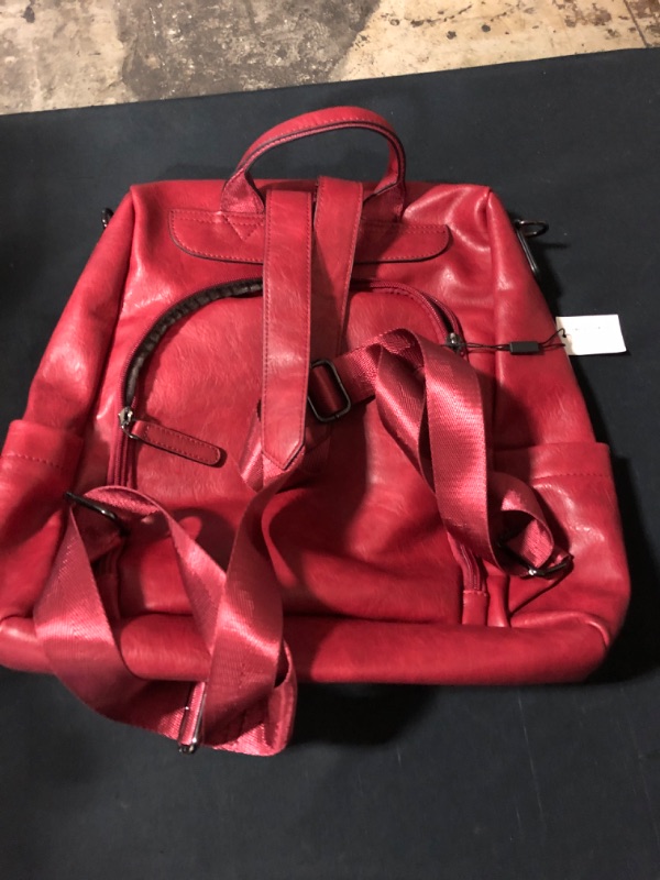 Photo 1 of BLACK BACKPACK WITH MULTIPLE ZIPPERS 