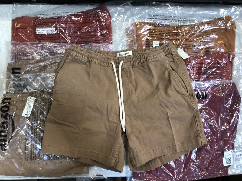 Photo 1 of BOX LOT.... MENS SHORTS. VARIOUS COLORS FEATURING SIZES 30-40 AND SMALL - XXXL (PHOTOS ARE GROUPED BY SIMILAR SIZE)