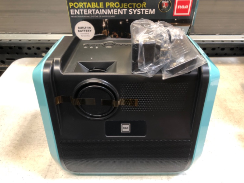 Photo 2 of RCA - RPJ060 Portable Projector Home Theater Entertainment System, Long Lasting Battery - 2.5 Hours per Charge - Outdoor, Rechargeable, Speakers - Enjoy Without Any Cable on The go - Phone/Stick/PC Black/Blue