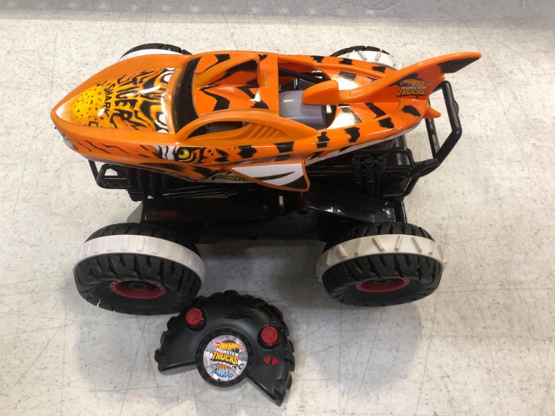 Photo 2 of Hot Wheels Monster Trucks, Remote Control Car, Monster Truck Toy with All-Terrain Wheels, 1:15 Scale Unstoppable Tiger Shark RC - UNABLE TO TEST