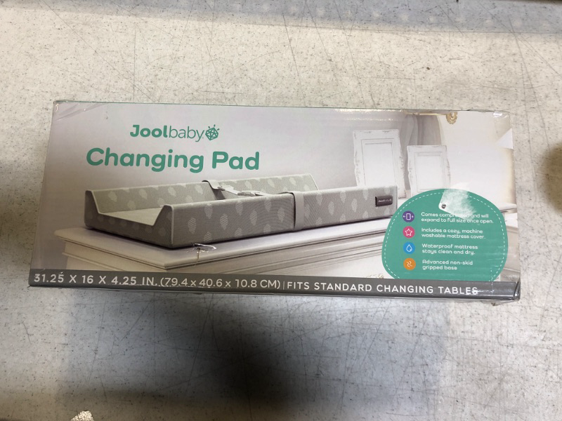 Photo 2 of Contoured Changing Pad - Waterproof & Non-Slip, Includes a Cozy, Breathable, & Washable Matress Cover - Jool Baby - FACTORY SEALED