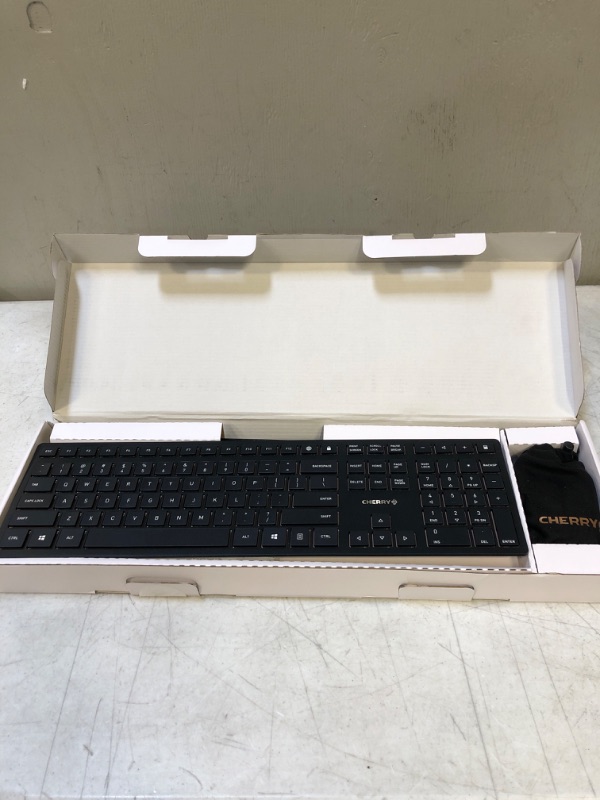 Photo 2 of CHERRY DW 9100 Slim Wireless Keyboard and Mouse Set Combo Rechargeable with SX Scissor Mechanism, Silent keystroke Quiet Typing with Thin Design for Work or Home Office. (Black & Bronze) ( USED ITEM ) 
