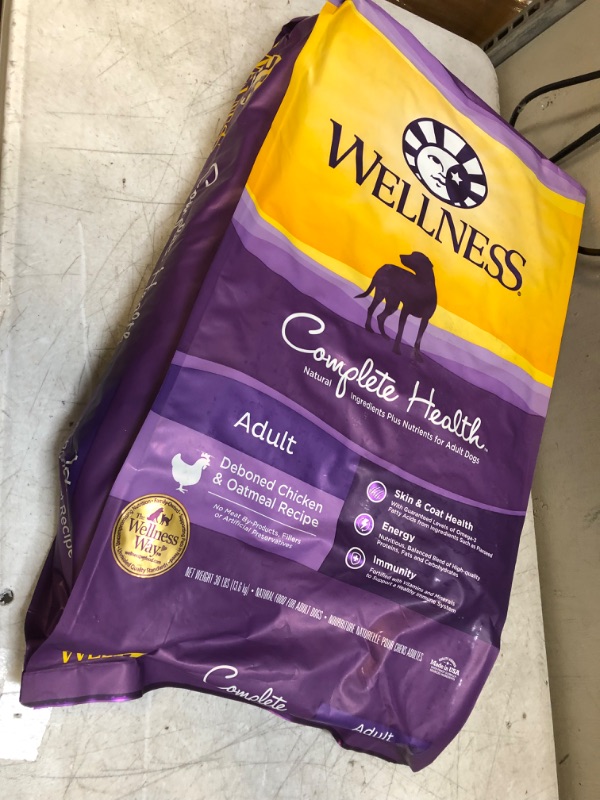 Photo 2 of Wellness Complete Health Dry Dog Food with Grains, Natural Ingredients, Made in USA with Real Meat, All Breeds, For Adult Dogs (Chicken & Oatmeal, 30-Pound Bag) Food Chicken & Oatmeal 30 Pound BB JAN 14 2023