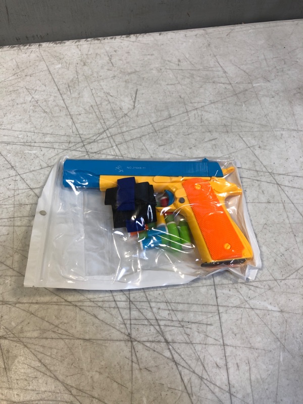 Photo 1 of Colt 1911 Kids Toy Gun with Ejecting Magazine and Colorful Soft Bullets - Style of M1911 with Slide Action Barrel for Training or Play - Unique Gift Intended for Fun,Not Distance or Accuracy (Blue) Orange