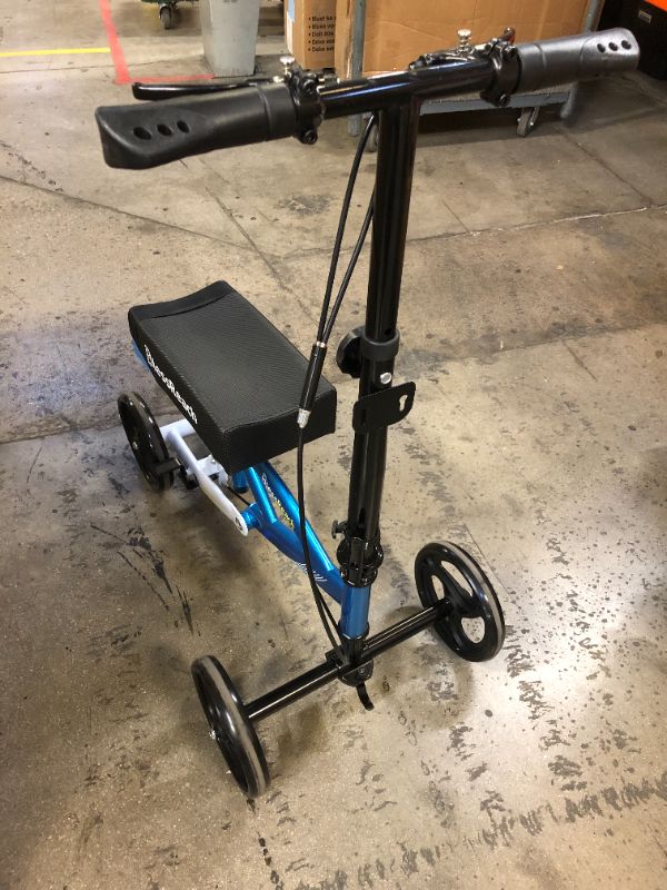 Photo 1 of BlessReach Economy Knee Scooter Steerable Knee Walker for Foot Injuries Compact Crutches with Dual Rear on-Wheel Brake and Shock Absorption Under The Knee pad Wb-2202 Blue