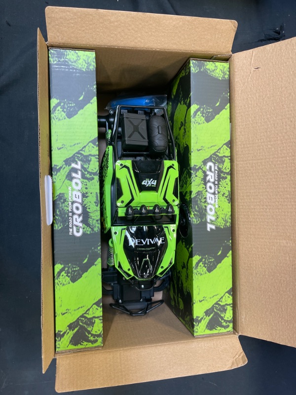 Photo 2 of CROBOLL 1:12 Large Remote Control Car for Boys with Upgraded Lifting Function, 4WD 20km/h RC Car Toys for Kids 4X4 Off-Road RC Rock Crawler, 2.4GHz All Terrain RC Monster Truck for 60Mins Play(Green)