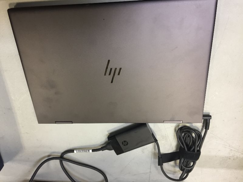 Photo 3 of HP Envy X360 2-in-1 15.6" FHD IPS Multitouch Screen Laptop | AMD Ryzen 7-4700U 8 cores | 16GB RAM | 512GB SSD | AMD Radeon | Backlit Keyboard | Fingerprint Reader | HDMI | Windows 10