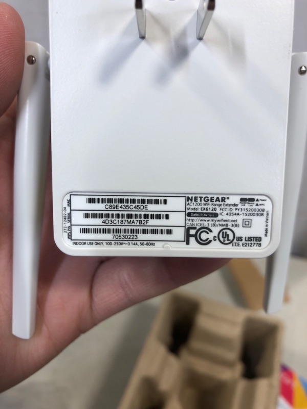 Photo 4 of NETGEAR Wi-Fi Range Extender EX6120 - Coverage Up to 1500 Sq Ft and 25 Devices with AC1200 Dual Band Wireless Signal Booster & Repeater (Up to 1200Mbps Speed), and Compact Wall Plug Design WiFi Extender AC1200 (UNABLE TO TEST)