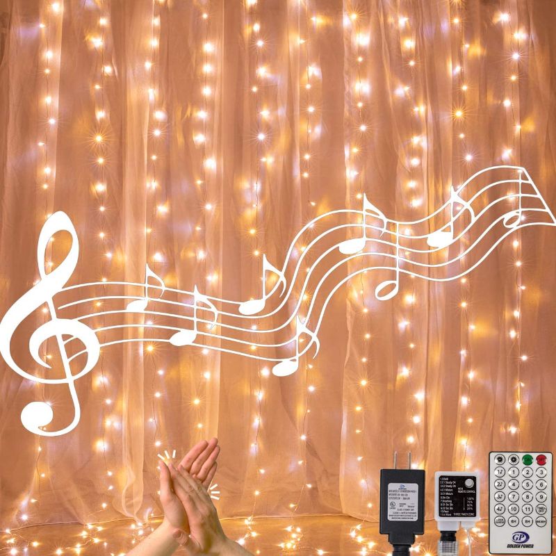 Photo 1 of AWQ 300 LED 6.6ft x 9.8ft Curtain String Light Window Fairy Lights 4 Music 11 Lighting Modes with Remote Control for Christmas Thanksgiving Party Home Outdoor Indoor Wall Decorations (Warm & White)
