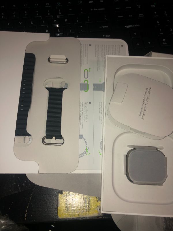 Photo 4 of Apple Watch Ultra 49mm Titanium Case with Midnight Ocean Band
