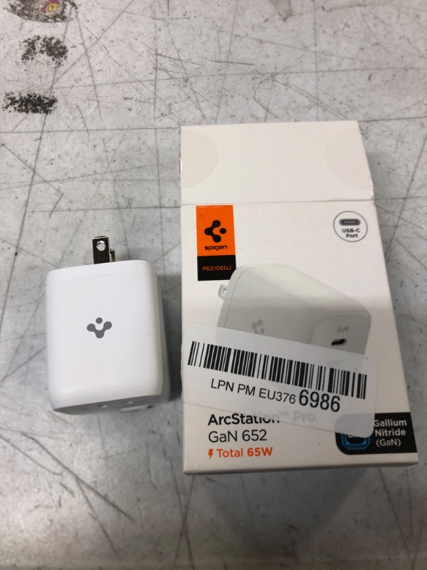 Photo 2 of Spigen GaN 652 Total 65W GaN III 2 Ports USB C Wall Charger with Spigen ArcWire USB C to Fast Charging Lightning Cable