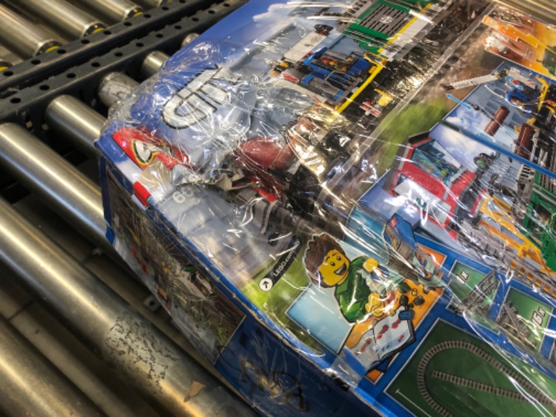 Photo 4 of LEGO City 60198  Cargo Train Remote Control Train Building Set with Tracks (1226 Pieces) - BOX IS MAJORLY DAMAGED - OPEN BOX - APPEARS TO BE MISSING 1 Track Plastic (RC Train) Curved - MISSING A FEW OTHER PIECES AS WELL