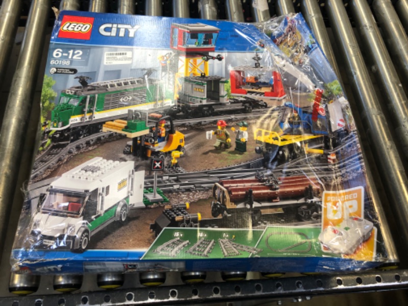 Photo 5 of LEGO City 60198  Cargo Train Remote Control Train Building Set with Tracks (1226 Pieces) - BOX IS MAJORLY DAMAGED - OPEN BOX - APPEARS TO BE MISSING 1 Track Plastic (RC Train) Curved - MISSING A FEW OTHER PIECES AS WELL