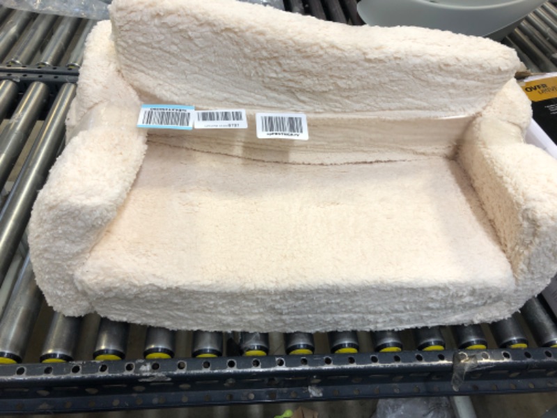 Photo 1 of Delta Children Cozee Flip-Out Sherpa 2-in-1 Convertible Sofa to Lounger for Kids, Cream