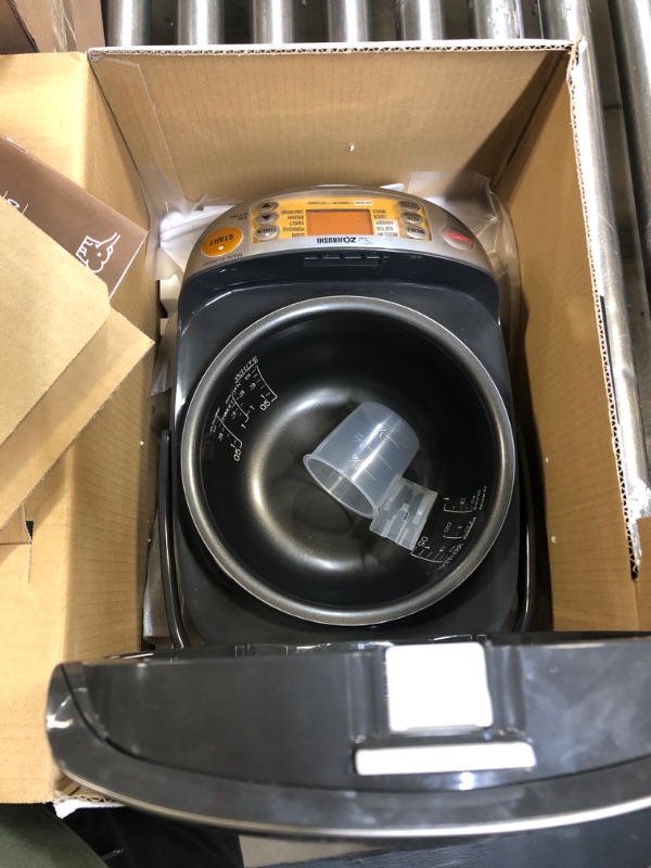 Photo 2 of Zojirushi NP-HCC10XH Induction Heating System Rice Cooker and Warmer, 1 L, Stainless Dark Gray Stainless Dark Gray 1 L UNABLE TO TEST FOR FUNCTIONALITY.