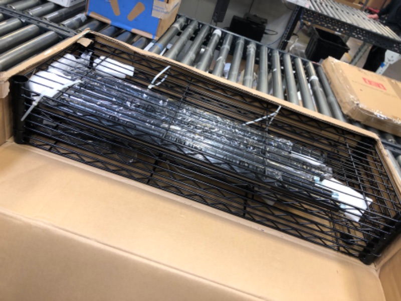 Photo 3 of Amazon Basics 4-Shelf Adjustable, Heavy Duty Storage Shelving Unit (350 lbs loading capacity per shelf), Steel Organizer Wire Rack, Black (36L x 14W x 54H) Black 4-Shelf Storage Unit without Caster