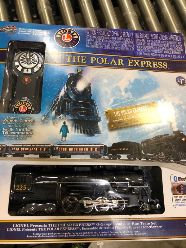 Photo 2 of Lionel The Polar Express LionChief 2-8-4 Set with Bluetooth Capability, Electric O Gauge Model Train Set with Remote Polar Express LionChief Train - Bluetooth