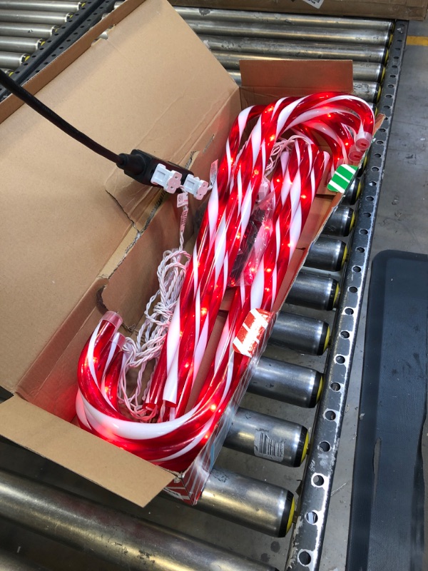 Photo 2 of 22" Christmas Candy Cane Lights - 10 Pack Christmas Pathway Markers Outdoor Decorations, Red Candy Cane Decorations Lights for Yard, Walkway, Lawn, Xmas Outside/Indoor Ornaments, 70 Lights Bulbs Red 22 inch