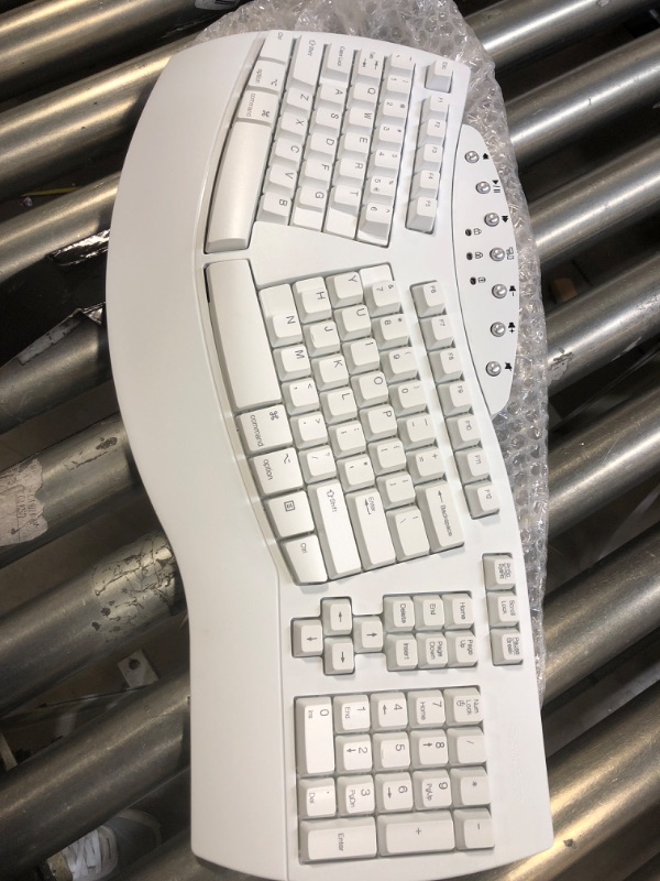 Photo 2 of Perixx Periboard-612 Wireless Ergonomic Split Keyboard, US English Layout
UNABLE TO TEST FOR FUNCTIONALITY.