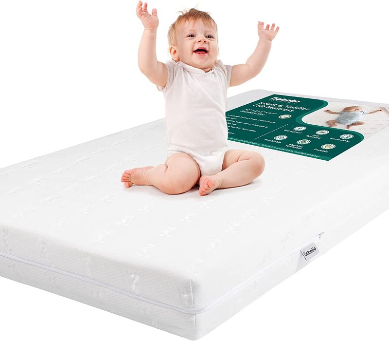 Photo 1 of BABELIO Breathable Crib Mattress, Dual-Sided Memory Foam Toddler Mattress, Waterproof Baby Mattresses for Crib and Toddler Bed, Removable and Machine Washable Mattress Cover, 52" x 27"
