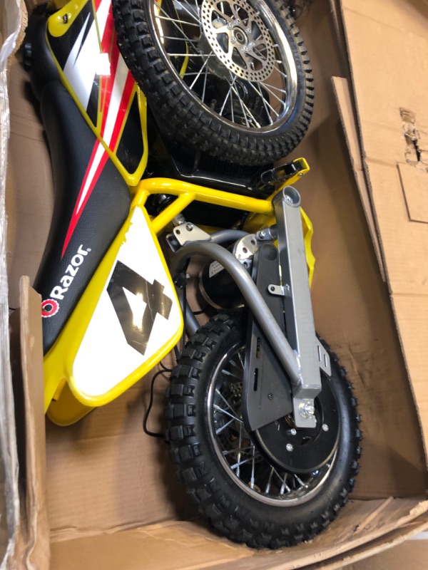 Photo 1 of Razor MX650 Dirt Rocket Electric-Powered Dirt Bike with Authentic Motocross Dirt Bike Geometry, Rear-Wheel Drive, HighTorque, Chain-Driven Motor, for Kids 13+, Yellow-----missing some hardware -----unable to test 