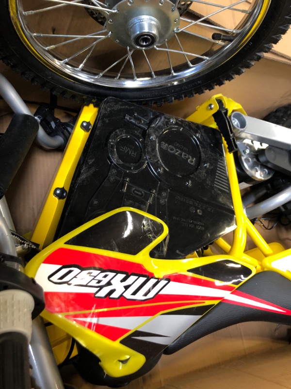 Photo 1 of Razor MX650 Dirt Rocket Electric-Powered Dirt Bike with Authentic Motocross Dirt Bike Geometry, Rear-Wheel Drive, HighTorque, Chain-Driven Motor, for Kids 13+, Yellow-----missing some hardware -----unable to test 