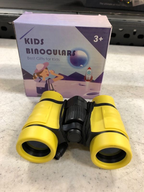 Photo 2 of Binoculars for Kids 4x30 Kids Binoculars Compact Shockproof Binoculars for 3-12 Boys Girls Best Gifts for Birthday Bird Watching Hunting Camping Exploring yellow