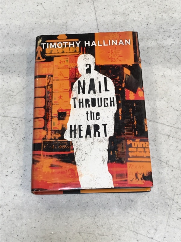 Photo 2 of A Nail Through the Heart by Timothy Hallinan
