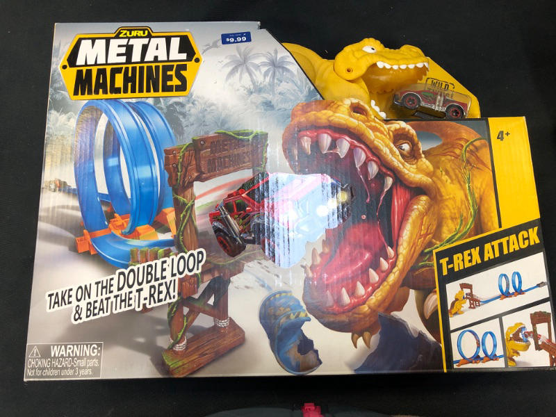 Photo 2 of Metal Machines T-Rex Attack Building Trackset with Mini Racing Car
