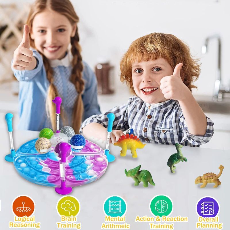 Photo 1 of Dinosaur Toys for Kids, Interactive Dinosaur Pop Fidget Toy Pop Dice Dinosaur Eggs Game Creative Dinosaur Birthday Party Supplies Push Pop Sensory Toys for Kids (Style B)