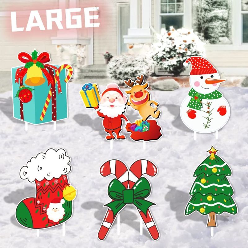 Photo 1 of 2022 Christmas Yard Sign with Stakes BIG SIZE for Holiday Lawn Yard Outdoor Decorations Stocking, Santa, Snowman, Candy, Tree, Gifts Merry Christmas Family theme, Xmas Home Decor Outdoor - Set of 6