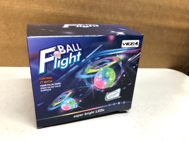 Photo 2 of Flying Ball Toys 2 Pcs Infrared Induction RC Flying Toy Built-in LED Light Disco Helicopter Shining Colorful Flying Drone Indoor and Outdoor Games Toys