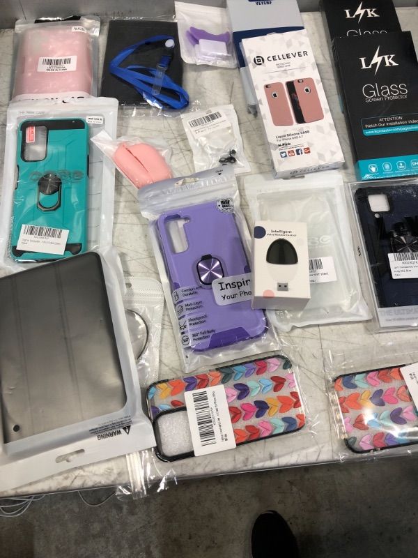 Photo 1 of Assorted Cellphone Cases and Accessories