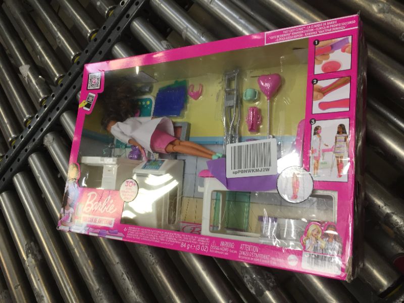 Photo 1 of Barbie Fast Cast Clinic Playset, Brunette Doctor Doll (12-in), 30+ Play Pieces, 4 Play Areas, Cast & Bandage Making, Medical & X-ray Stations, Exam Table, Gift Shop & More, Great Toy Gift