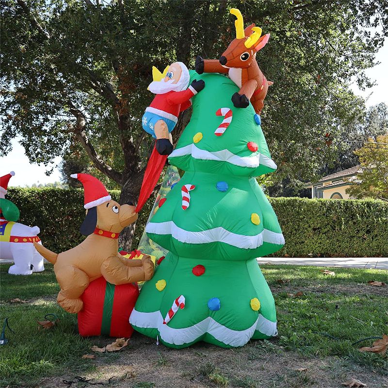 Photo 1 of  7.3ft Christmas Inflatables Outdoor Decorations, Blow Up Santa Claus Reindeer Dog Christmas Tree Inflatable with Built-in LEDs for Christmas Indoor Outdoor Yard Lawn Garden Decorations