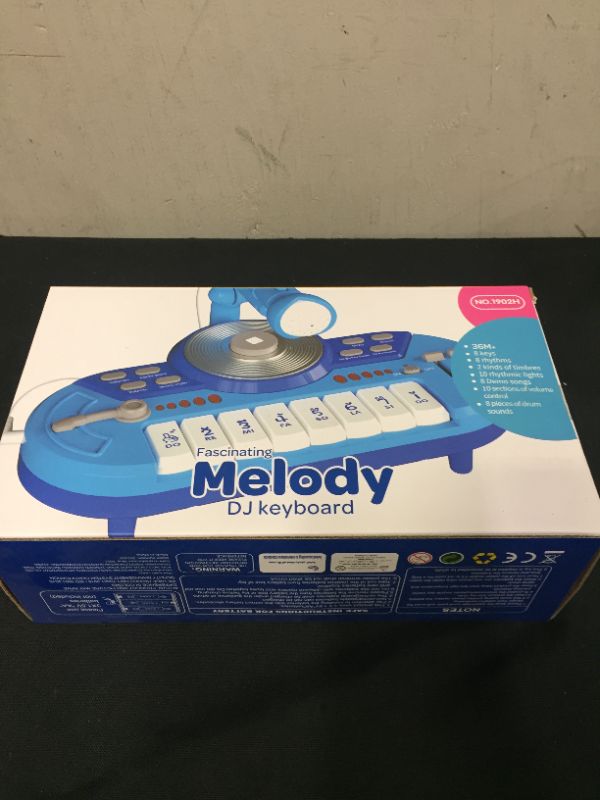 Photo 2 of Baby Toys for 1+ Year Old Gift, Blue Piano Toy for Toddlers 8 Keys DJ Keyboard Piano with Microphone and Light Early Learning Educational Musical Toys
