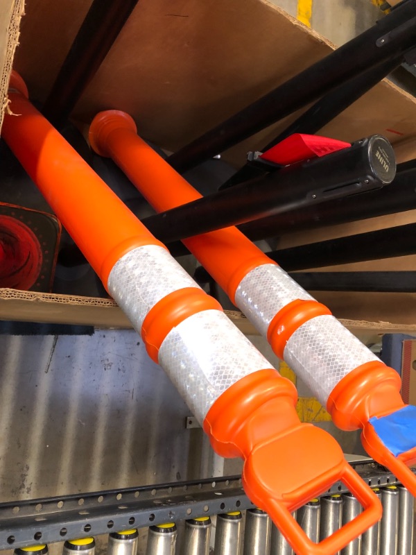 Photo 8 of 13 items ---uline eazy let go barrier line posts 8 posts -------spiral hose canister ------2 orange barrier posts missing bottoms and 2 orange safety cones ----view pictures 