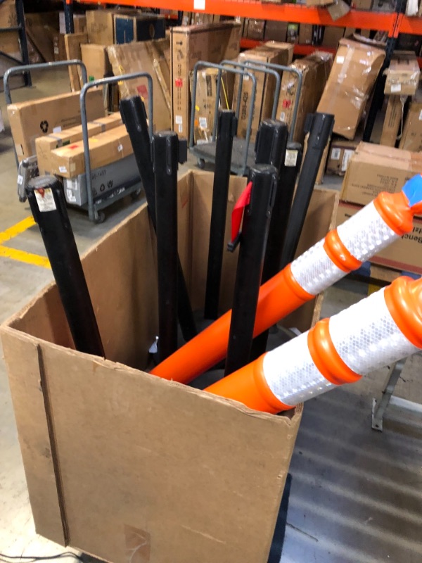 Photo 2 of 13 items ---uline eazy let go barrier line posts 8 posts -------spiral hose canister ------2 orange barrier posts missing bottoms and 2 orange safety cones ----view pictures 