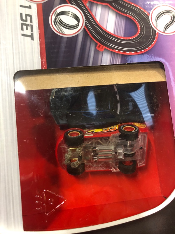 Photo 3 of Carrera GO!!! 62477 Disney Pixar Cars Neon Nights Electric Slot Car Racing Kids Toy Race Track Set Includes 2 Controllers and 2 Cars in 1:43 Scale Disney Cars Neon
