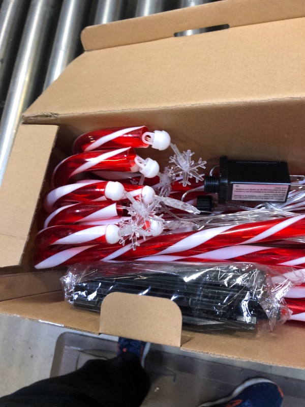 Photo 1 of Outside Christmas Decorations, 16 Pack 28” Candy Cane Lights Outdoor Pathway, Candy Cane Lights with Snowflake, 52ft in Length 160 LED Lights in Total, 30V Candy Cane Pathway Lights,Brighter and Safer
