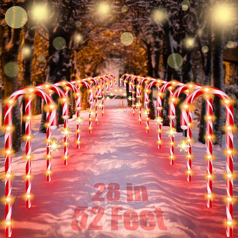 Photo 1 of Outside Christmas Decorations, 16 Pack 28” Candy Cane Lights Outdoor Pathway, Candy Cane Lights with Snowflake, 52ft in Length 160 LED Lights in Total, 30V Candy Cane Pathway Lights,Brighter and Safer
