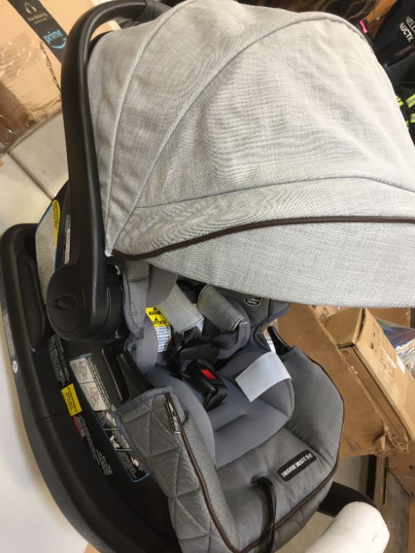 Photo 1 of Graco® Premier SnugRide® SnugFit™ 35 XT Infant Car Seat, Midtown™ Collection --- Box Packaging Damaged, Item is New
