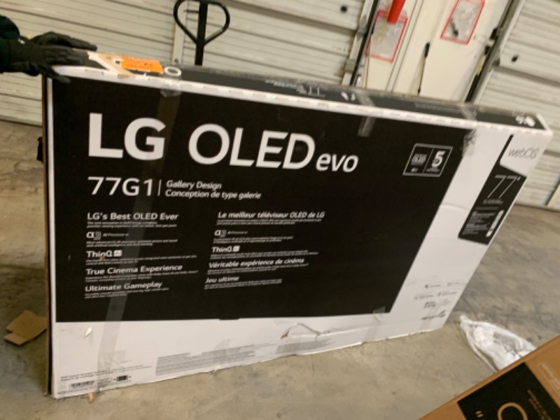 Photo 2 of DOES NOT TURN ON, BROKEN, SCREEN FLASHES ON THEN OFF, BROKEN SCREEN. LG OLED G1 Series 77” Alexa Built-in 4k Smart OLED evo TV, Gallery Design, 120Hz Refresh Rate, AI-Powered 4K, Dolby Vision IQ and Dolby Atmos, WiSA Ready (OLED77G1PUA, 2021) 77 Inch TV O