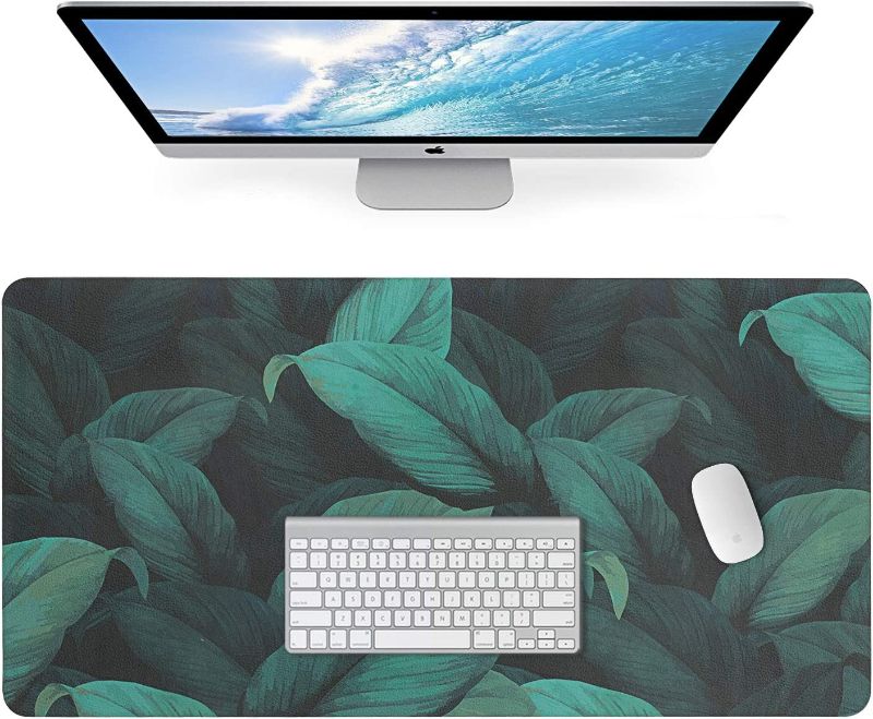 Photo 1 of Desk Pad,Mouse Pad,Laptop Desk Pad, Leather Desk Wrting Mat,31.5''x15.7'' Non-Slip Waterproof Pu Leather for Office and Home.
