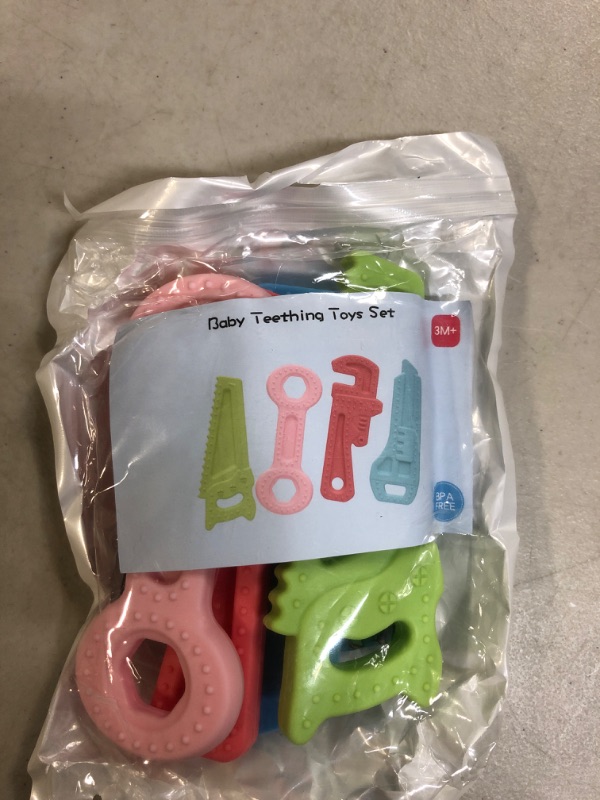 Photo 2 of 4Pack Teething Toys for Babies 0-6 Months with Lanyard, Baby Infant Teething Toys for Molars 6-12 Months, Freezer Safe Soft Silicone Baby Molar Teether Chew Toys Wrench Pliers Shape