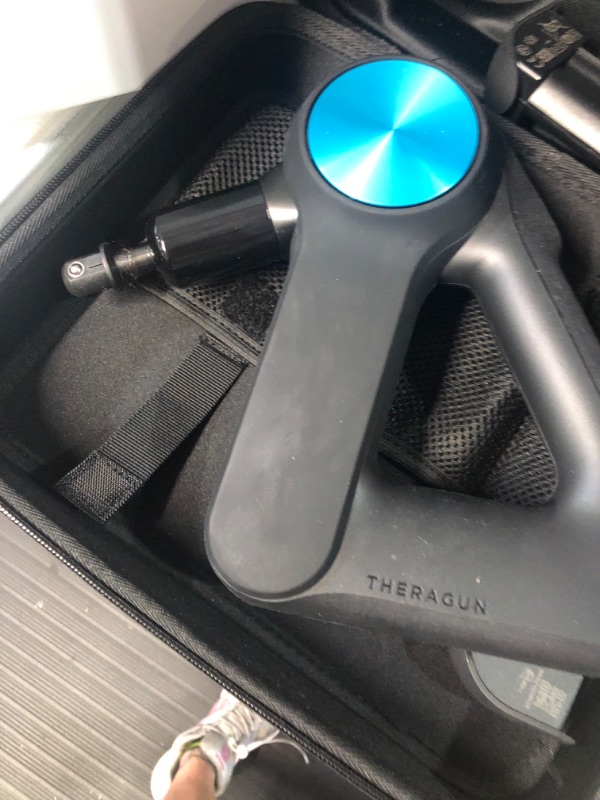 Photo 4 of  ***** USED ITEM NEEDS TO BE CLEANED ****TheraGun Pro - Handheld Massage Gun - Athlete Approved Bluetooth Enabled Percussion Massage Gun for Pain Relief - Deep Tissue Muscle Massager with Quietforce Technology - 4th Generation - Black Black - 4th Gen